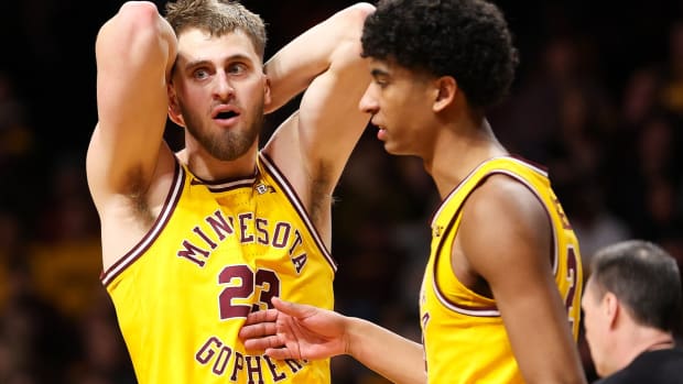 Feb 22, 2024; Minneapolis, Minnesota, USA; Minnesota Golden Gophers forward Parker Fox (23) reacts to a foul charge called against him during the second half against the Ohio State Buckeyes at Williams Arena.